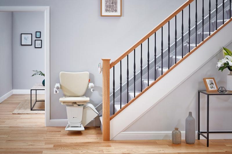 Handicare 1100 stairlift folded away for minimal space usage