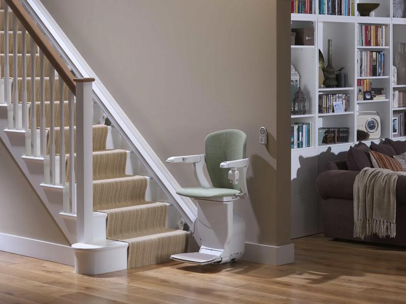 Stannah Starla stairlift with wooden trim and fabric upholstery